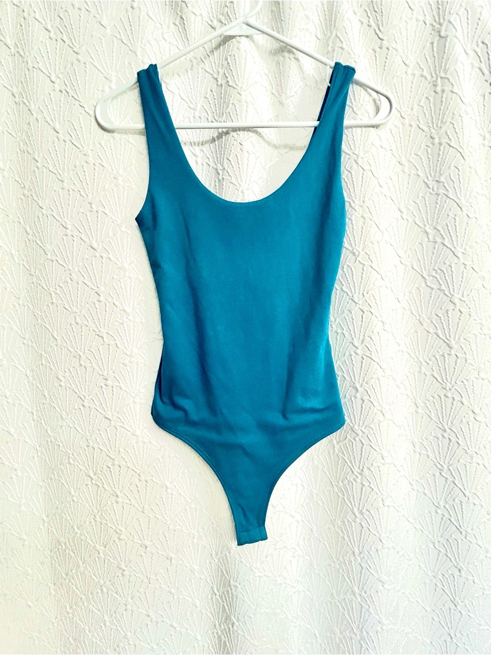 Women’s teal bodysuit
